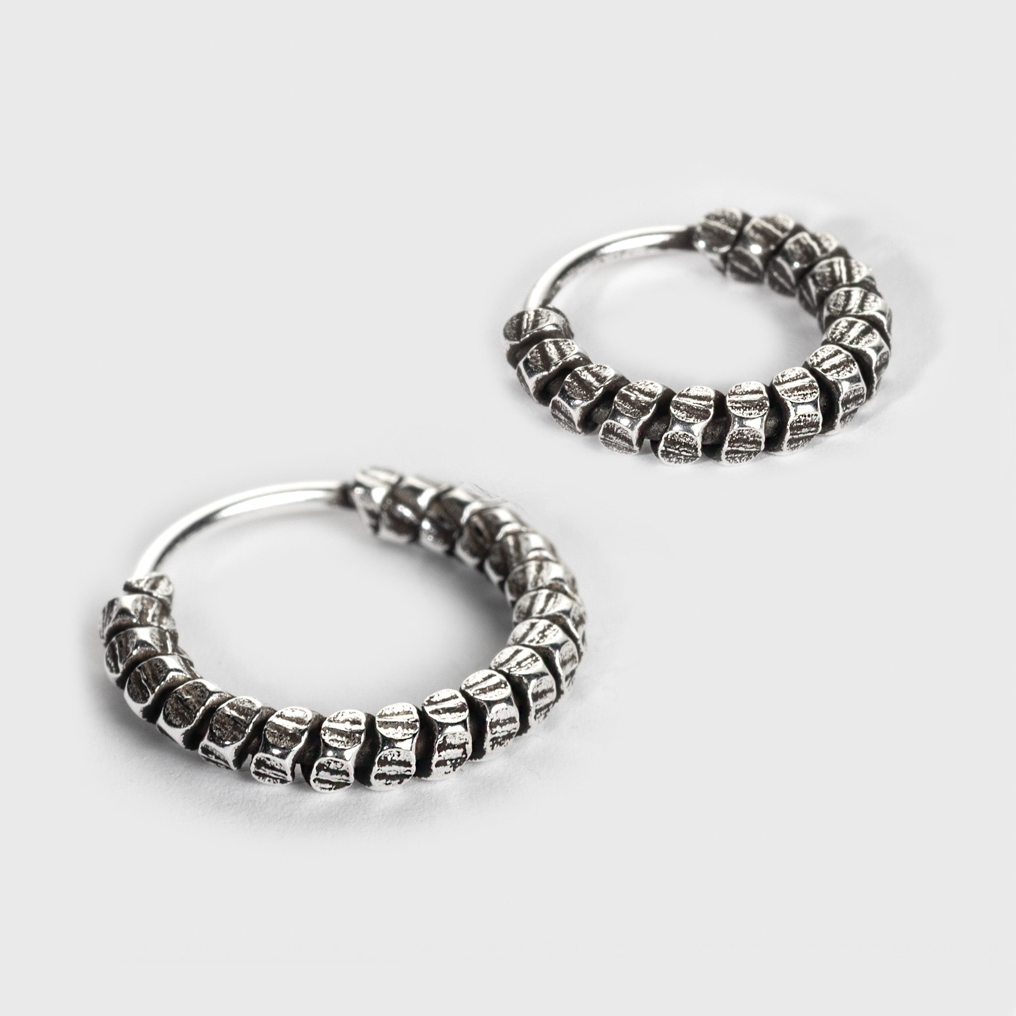 Silver Nose Ring, Segmented Design with an oxidized finish – Grimfrost